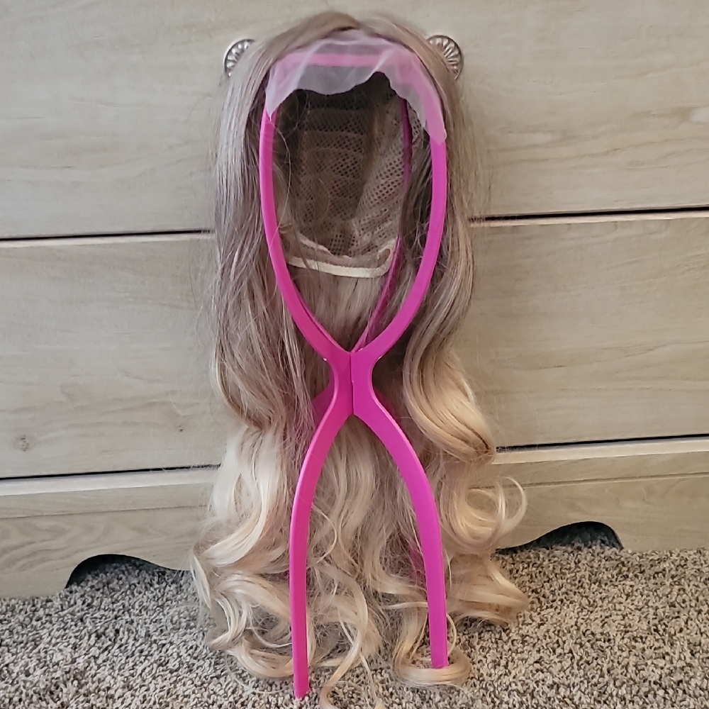 Blonde Ombre Lace Front Synthetic Wig about 24 inches long and is low density